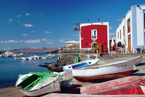 Boats and old red house, Old Port, Puerto del Carmen, Lanzarote, Canary Islands