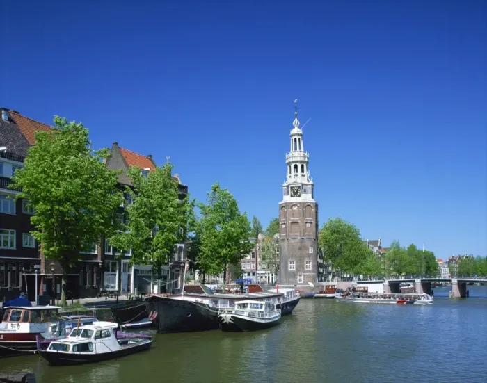 Framed Print : Boats on the Ovde Schans Canal with the Montelbaanstoren tower behind, in Amsterdam Framed Print : Boats on the Ovde Schans Canal with the Montelbaanstoren tower behind, in Amsterdam