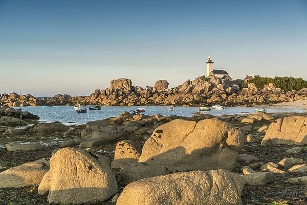 Boats and Pontusval lighthouse, Brignogan Plage, Finistere, Brittany, France, Europe