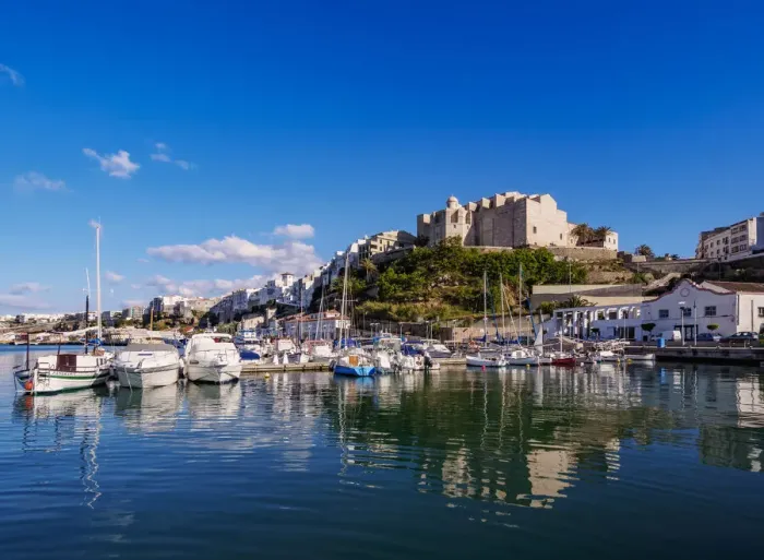 Framed Print : Boats in port and Saint Francis Monastery, Mahon (Mao), Menorca (Minorca)