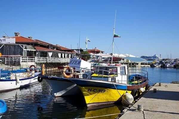 Boats and restaurants along the harbour quay, Nessebar, Black Sea, Bulgaria, Europe