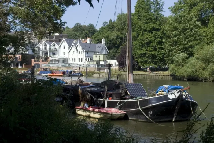 Framed Print : Boats, one with a solar panel, moored on the Thames at Richmond, Surrey Framed Print : Boats, one with a solar panel, moored on the Thames at Richmond, Surrey