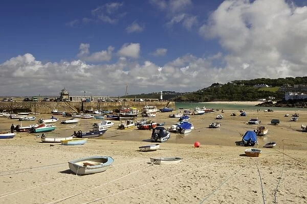 Boats in St Ives harbour at low tide, Cornwall, England