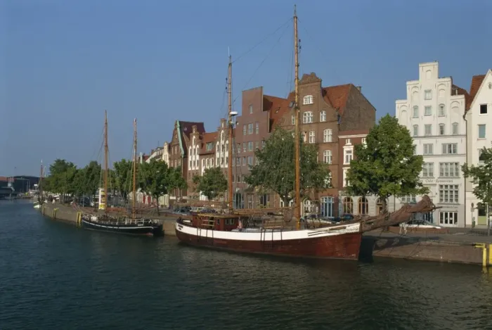 Framed Print : Boats with tall masts on the waterfront of Lubeck City Framed Print : Boats with tall masts on the waterfront of Lubeck City