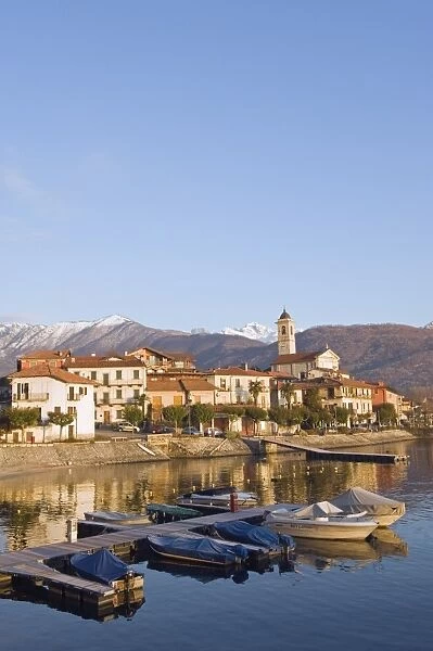 Boats and town houses on waterfront in Feriolo, Lake Maggiore, Italian Lakes