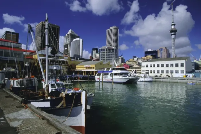 Framed Print : Boats on waterfront with skyline including Sky City Tower beyond Framed Print : Boats on waterfront with skyline including Sky City Tower beyond