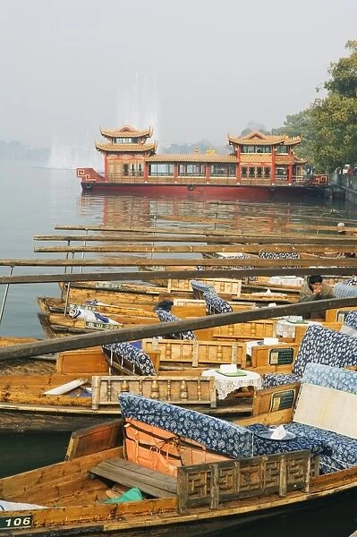 Boats on the waters of West Lake, Hangzhou, Zhejiang Province, China, Asia