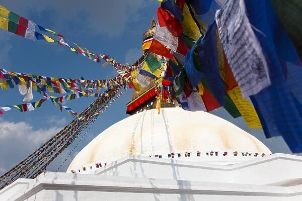 Bodhnath Stupa, UNESCO World Heritage Site, surrounded by colourful Buddhist prayer flags