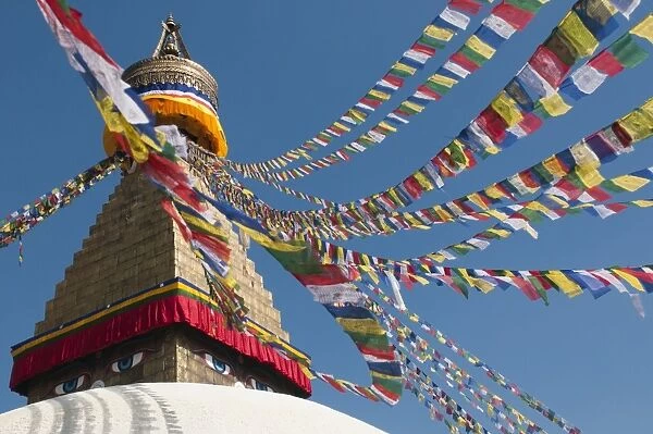 Bouddha (Boudhanath) (Bodnath) in Kathmandu is covered in colourful prayer flags