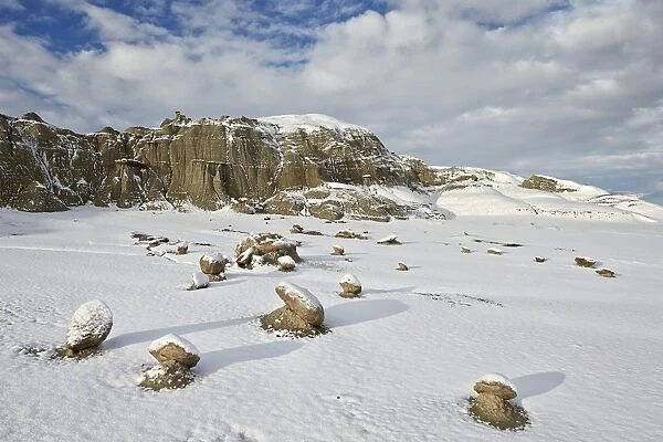 Boulders with fresh snow, Bisti Wilderness, New Mexico, United States of America, North America
