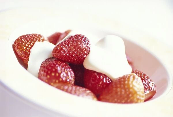 Bowl of strawberries and cream