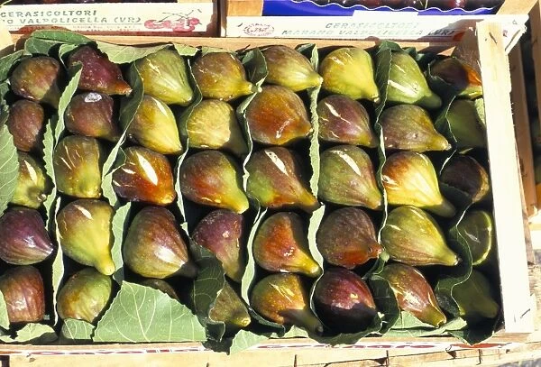 A box of figs for sale in a market