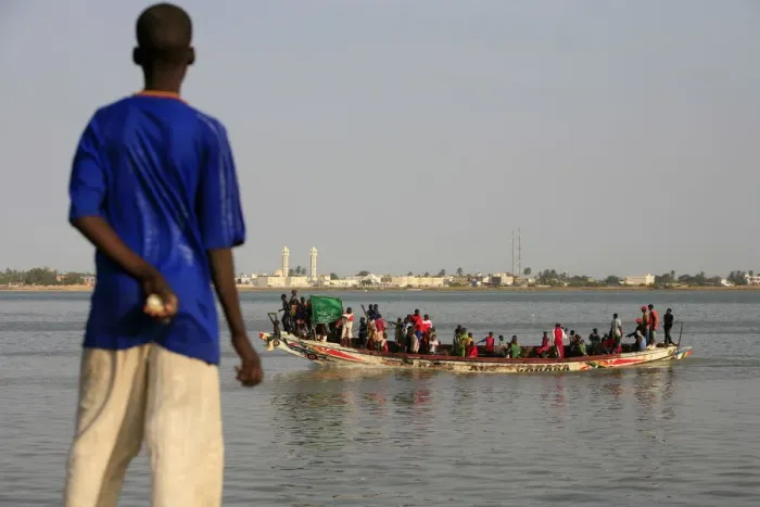 Framed Print : Boy looking at a boat, Saint Louis, Senegal, West Africa, Africa Framed Print : Boy looking at a boat, Saint Louis, Senegal, West Africa, Africa