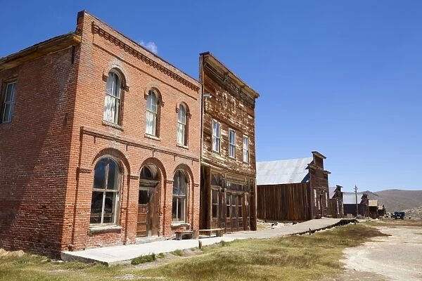 Brick Post Office and Dechambeau hotel, next to the wooden IOOF or Bodie Odd Fellows Lodge
