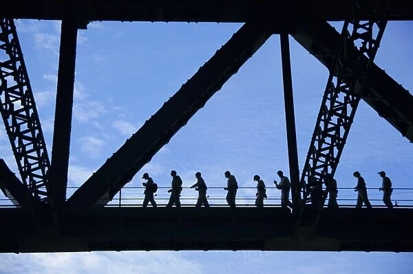 Bridge climb participants in silhouette, Sydney Harbour Bridge, Sydney