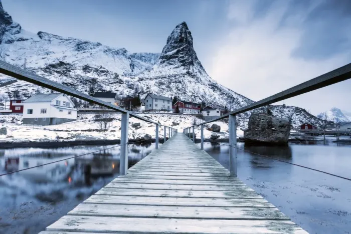 Framed Print : A bridge over the cold sea connects a typical fishing village. Reine, Lofoten Islands Framed Print : A bridge over the cold sea connects a typical fishing village. Reine, Lofoten Islands