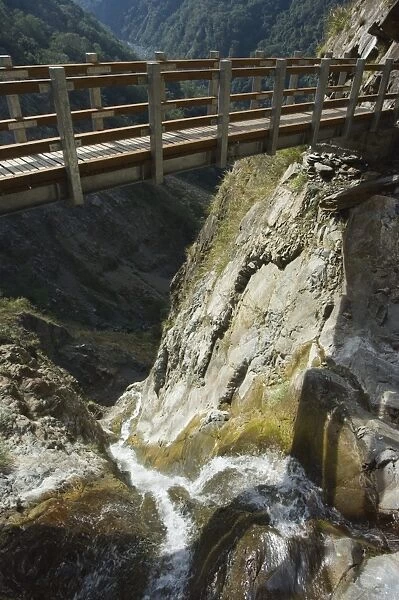 Bridge over waterfall