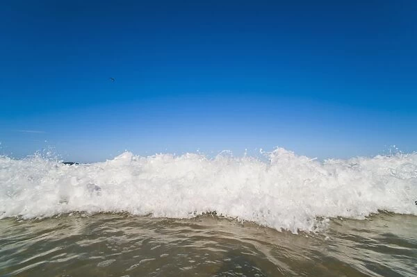Bright blue sky and waves breaking at Surfers Paradise Beach, Gold Coast, Queensland, Australia, Pacific