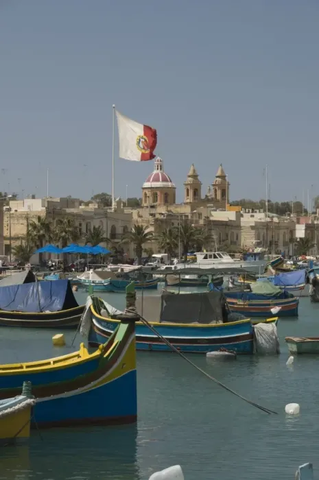 Framed Print : Brightly coloured fishing boats called Luzzus at the fishing village of Marsaxlokk Framed Print : Brightly coloured fishing boats called Luzzus at the fishing village of Marsaxlokk