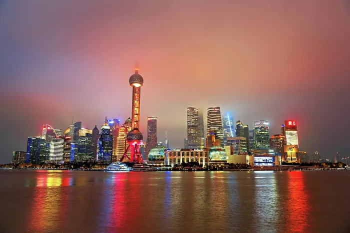 Framed Print : Brightly lit skyline of Lujiazui shrouded in fog at night, Shanghai, China. Lujiazui is the financial district of Shanghai Framed Print : Brightly lit skyline of Lujiazui shrouded in fog at night, Shanghai, China. Lujiazui is the financial district of Shanghai