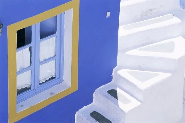 Detail of brightly painted house in Oia
