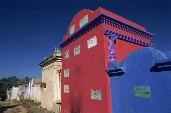 Brightly painted tombs in the technicolor cemetery