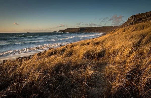 Brissons and Cape Cornwal in the far distance in the late afternoon, Sennen Beach