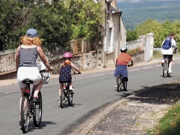 British family cycling through the Loire Valley, Sancerre, Loire, France, Europe
