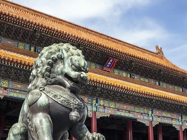 Bronze Chinese lion (female) guards the entry to the palace buildings, Forbidden City