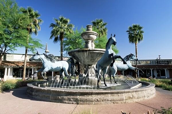 Bronze horse fountain in the up-market 5th Avenue shopping district