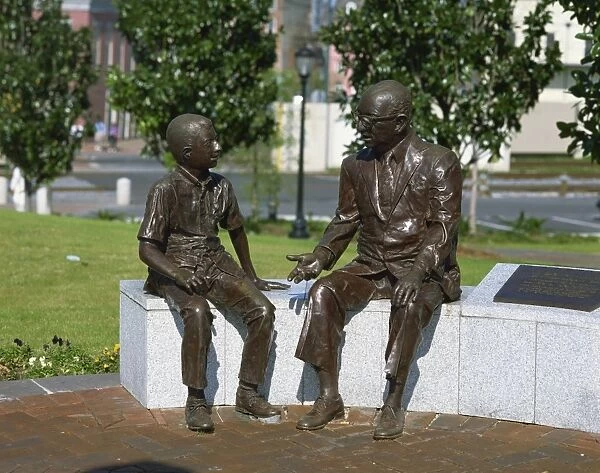 Bronze man and boy statue, Woldenberg Riverfront Park, New Orleans, Louisiana