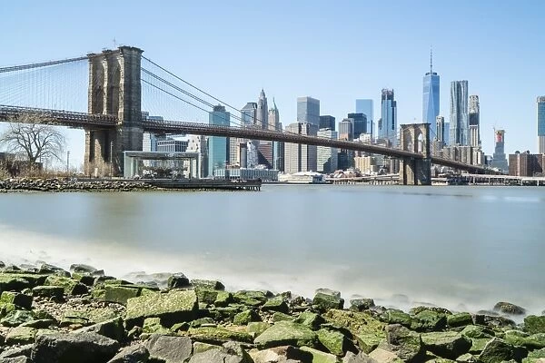 Brooklyn Bridge and Lower Manhattan skyline viewed from Brooklyn side of East River