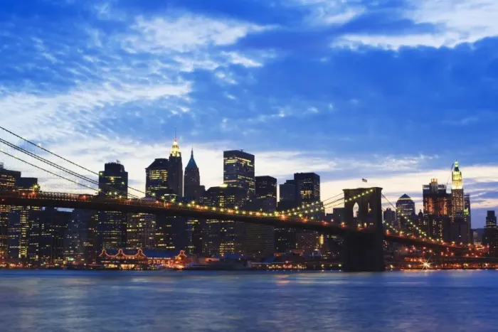 Framed Print : Brooklyn Bridge spanning the East River and the Lower Manhattan skyline at dusk Framed Print : Brooklyn Bridge spanning the East River and the Lower Manhattan skyline at dusk
