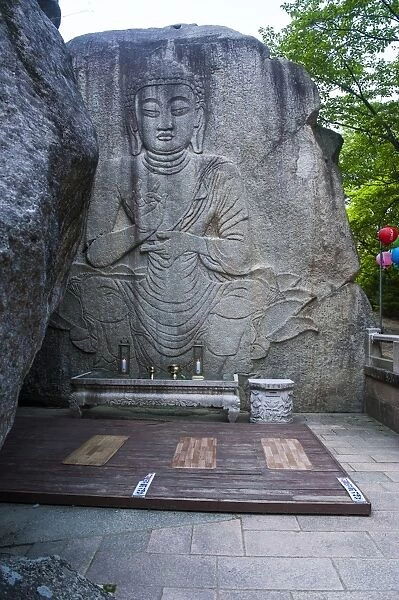 Buddha carved in a rock cliff, Beopjusa Temple Complex, South Korea, Asia