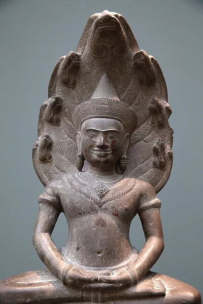 Buddha protected by the Naga, Musee Guimet, Museum of Asian Arts. Paris, France, Europe