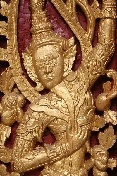 Buddhist deity at Wat Siphoutthabath, Luang Prabang, Laos, Indochina, Southeast Asia