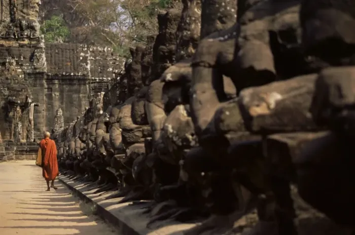 Framed Print : Buddhist monk approaching South Gate, Angkor Thom, Angkor, UNESCO World Heritage Site Framed Print : Buddhist monk approaching South Gate, Angkor Thom, Angkor, UNESCO World Heritage Site