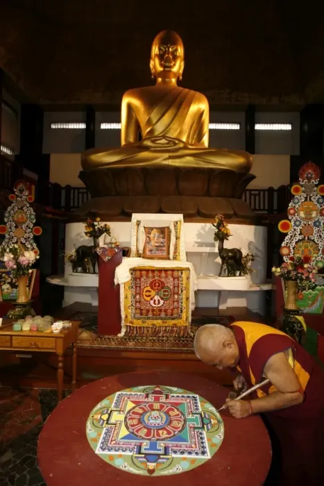 Framed Print : Buddhist monk drawing a mandala, Paris, Ile de France, France, Europe Framed Print : Buddhist monk drawing a mandala, Paris, Ile de France, France, Europe