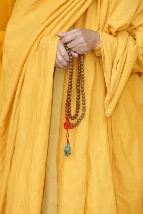 Framed Print : Buddhist monk holding prayer beads, Thiais, Val de Marne, France, Europe Framed Print : Buddhist monk holding prayer beads, Thiais, Val de Marne, France, Europe