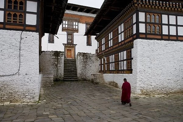 Buddhist monk in monastery, Bumthang, Bhutan, Asia
