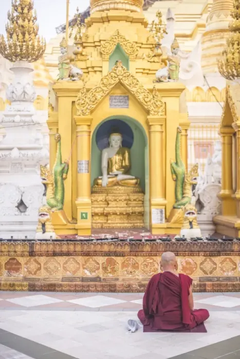 Framed Print : Buddhist monk praying at Shwedagon Pagoda (Shwedagon Zedi Daw) (Golden Pagoda), Yangon (Rangoon)