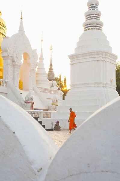 Buddhist monk walking around Wat Suan Dok Temple in Chiang Mai, Thailand, Southeast Asia, Asia