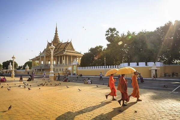 Buddhist monks at a square in front of the Royal Palace, Phnom Penh, Cambodia, Indochina, Southeast Asia, Asia