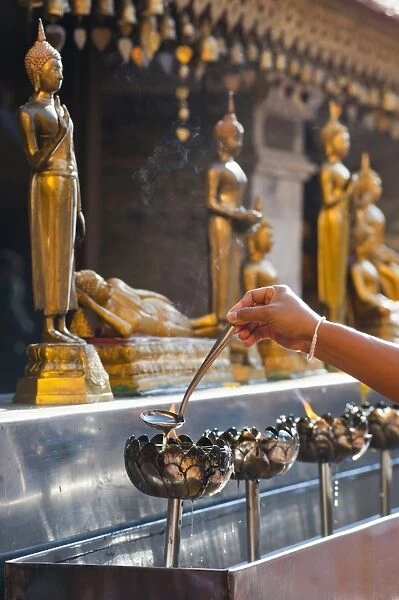 Buddhist person praying, Wat Doi Suthep Temple, Chiang Mai, Thailand, Southeast Asia, Asia
