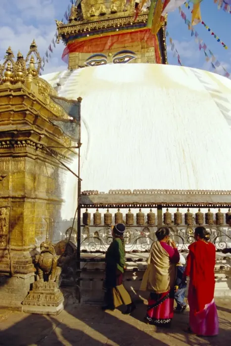Framed Print : Buddhist stupa and believers spinning prayer wheels Framed Print : Buddhist stupa and believers spinning prayer wheels