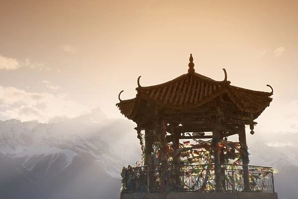Buddhist stupa on way to Deqin, on the Tibetan Border, with the Meili Snow Mountain peak in the background, Dequin, Shangri-La region, Yunnan Province