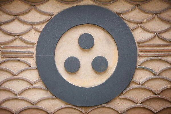 Buddhist symbol of one circle and the three jewels of Buddhism, the Buddha