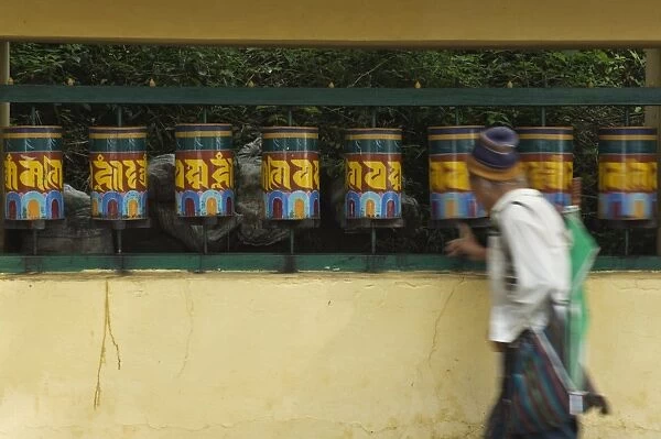 Buddhist turning prayer wheels