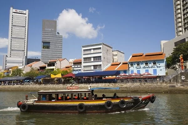Bumboat River Taxi passing bars and restaurants in