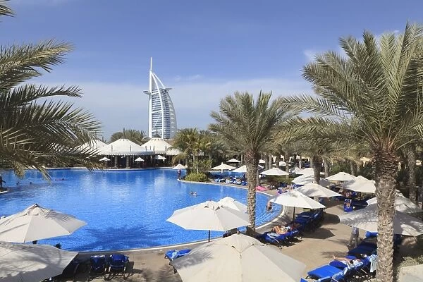 Burj Al Arab seen from the swimming pool of the Madinat Jumeirah Hotel